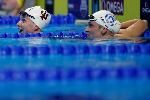 Lilly King and Annie Lazor of the United States reacts after competing in a semifinal heat for the Women’s 100m breaststroke during Day Two of the...