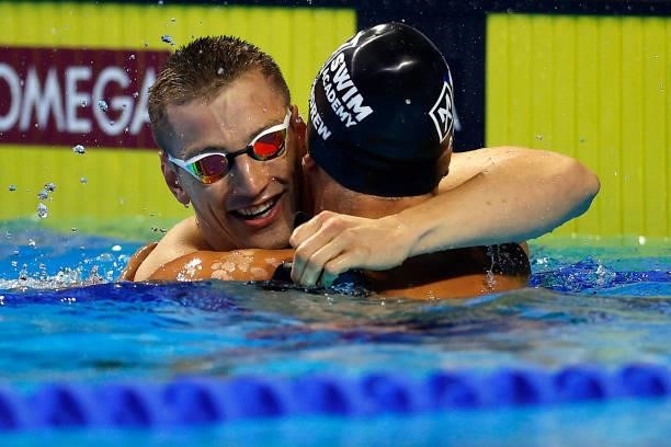 Andrew Wilson and Michael Andrew of the United States reacts after competing in the Men’s 100m breaststroke final during Day Two of the 2021 U.S....