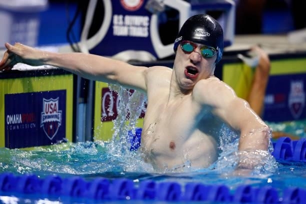 Hunter Armstrong of the United States reacts in a semifinal heat for the Men’s 100m backstroke during Day Two of the 2021 U.S. Olympic Team Swimming...