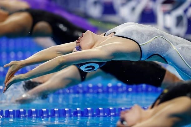Olivia Smoliga competes in a semifinal heat for the Women’s 100m backstroke during Day Two of the 2021 U.S. Olympic Team Swimming Trials at CHI...