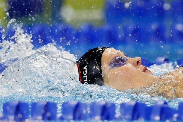 Olivia Smoliga of the United States competes in a semifinal heat for the Women’s 100m backstroke during Day Two of the 2021 U.S. Olympic Team...