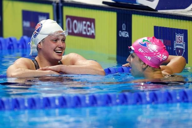 Phoebe Bacon and Regan Smith of the United States react after competing in a semifinal heat for the Women’s 100m backstroke during Day Two of the...