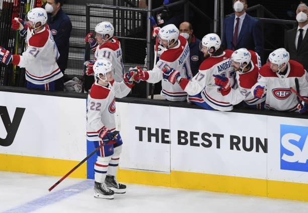 Cole Caufield of the Montreal Canadiens is congratulated by his teammates after scoring against the Vegas Golden Knights in Game One of the Stanley...