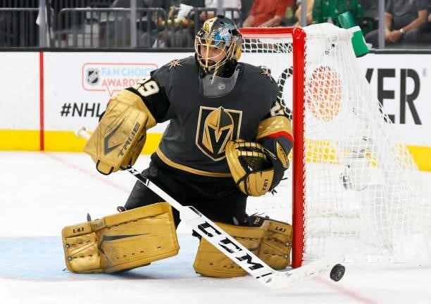 Marc-Andre Fleury of the Vegas Golden Knights deflects the puck in the third period in Game One of the Stanley Cup Semifinals during the 2021 Stanley...