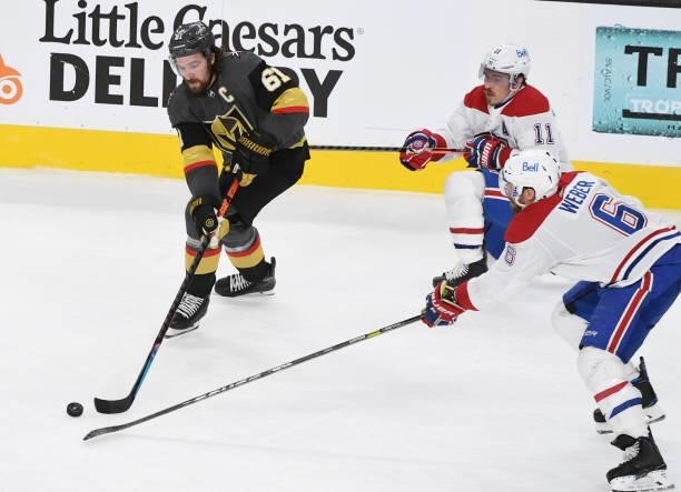 Mark Stone of the Vegas Golden Knights controls the puck against Shea Weber and Brendan Gallagher of the Montreal Canadiens during Game One of the...