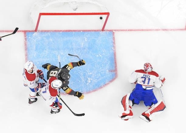 Jonathan Marchessault of the Vegas Golden Knights celebrates a goal by teammate Alec Martinez against Carey Price of the Montreal Canadiens during...