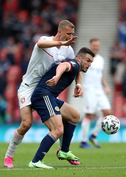 John McGinn of Scotland battles for the ball with Tomas Soucek of Czech Republic during the UEFA Euro 2020 Championship Group D match between...