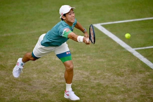 Kei Nishikori of Japan plays a forehand in his match against Ricardas Berkankis of Lithuania during day 4 of the Noventi Open at OWL-Arena on June...