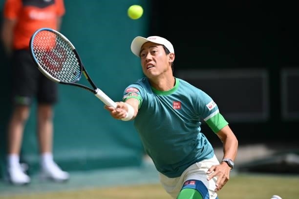 Kei Nishikori of Japan plays a forehand in his match against Ricardas Berkankis of Lithuania during day 4 of the Noventi Open at OWL-Arena on June...