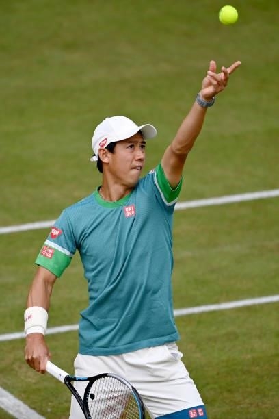 Kei Nishikori of Japan serves in his match against Ricardas Berkankis of Lithuania during day 4 of the Noventi Open at OWL-Arena on June 15, 2021 in...