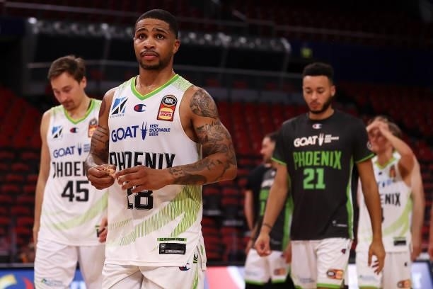 Keifer Sykes of the Phoenix and his team mates look dejected as they leave the court after defeat during game three of the NBL Semi-Final Series...