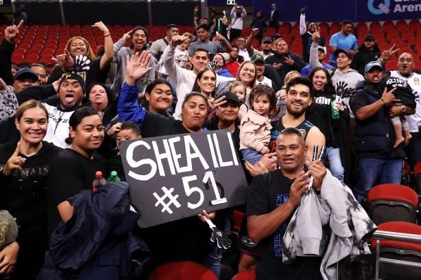 Shea Ili of Melbourne United poses with his family and supporters as he celebrates victory during game three of the NBL Semi-Final Series between...