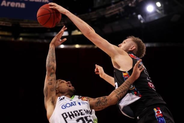 Keifer Sykes of the Phoenix has his shot blocked by Jock Landale of Melbourne United during game three of the NBL Semi-Final Series between Melbourne...