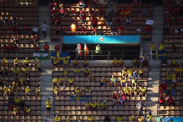 Fans of Spain and Sweden cheer during the UEFA Euro 2020 Championship Group E match between Spain and Sweden at the La Cartuja Stadium on June 14,...