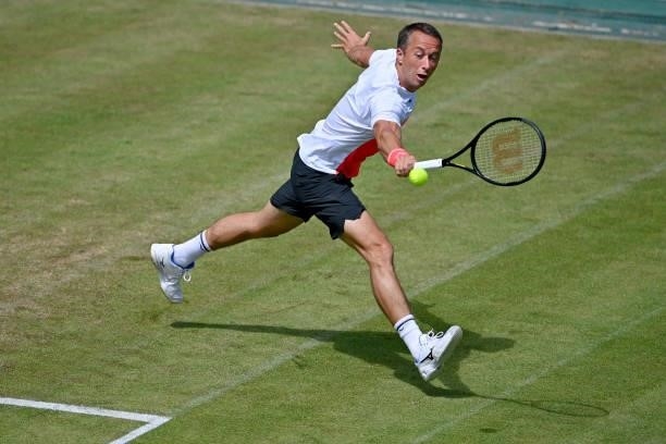 Philipp Kohlschreiber of Germany plays a backhand in his match against Jurij Rodionov of Austria during day 4 of the Noventi Open at OWL-Arena on...