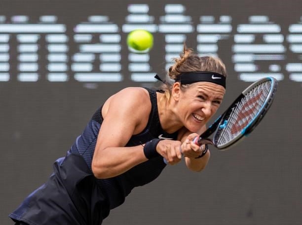 Victoria Azarenka of Belarus hits a backhand against Andrea Petkovic of Germany in the women's singles match during day 4 of the bett1open at LTTC...