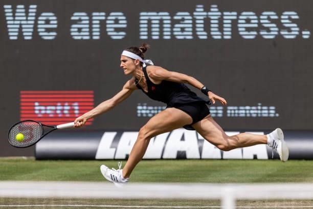 Andrea Petkovic of Germany streches to play plays a forehand against Victoria Azarenka of Belarus in the women's singles match during day 4 of the...