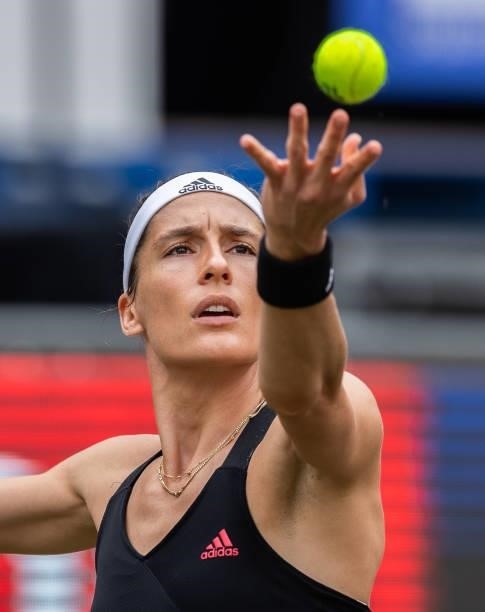 Andrea Petkovic of Germany serves against Victoria Azarenka of Belarus in the women's singles match during day 4 of the bett1open at LTTC Rot-Weiß...