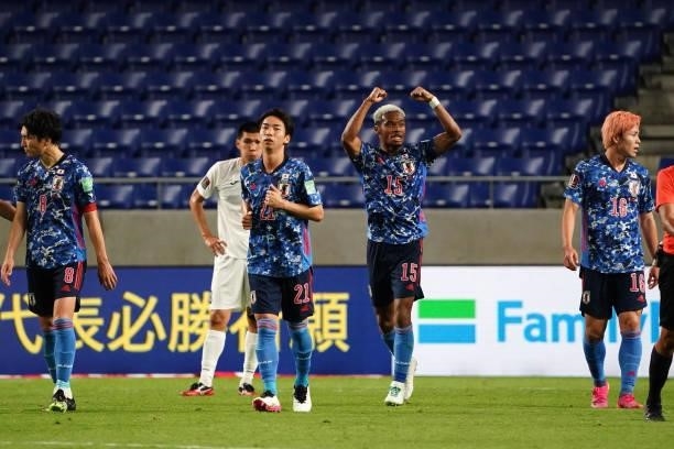 Ado Onaiwu of Japan celebrates scoringhis side's first goal with his team mates during the FIFA World Cup Asian Qualifier second round Group F match...
