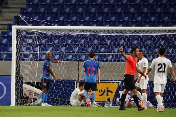 Ado Onaiwu of Japan celebrates scoring his side's second goal during the FIFA World Cup Asian Qualifier second round Group F match between Japan and...