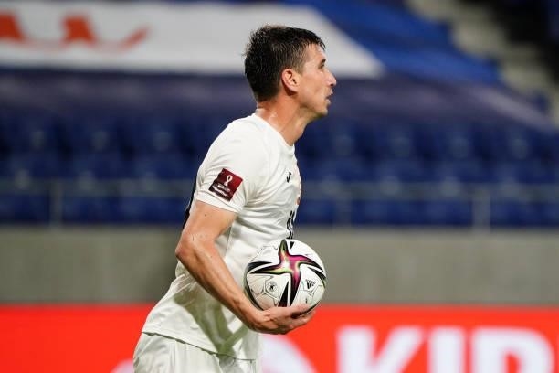 Mirlan Murzaev of Kyrgyz reacts after scoring his side's first goal from the penalty spot during the FIFA World Cup Asian Qualifier second round...