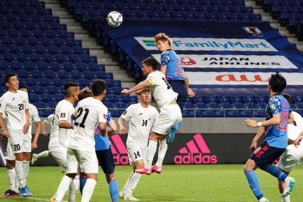 Sho Sasaki of Japan heads to score his side's fourth goal during the FIFA World Cup Asian Qualifier second round Group F match between Japan and...