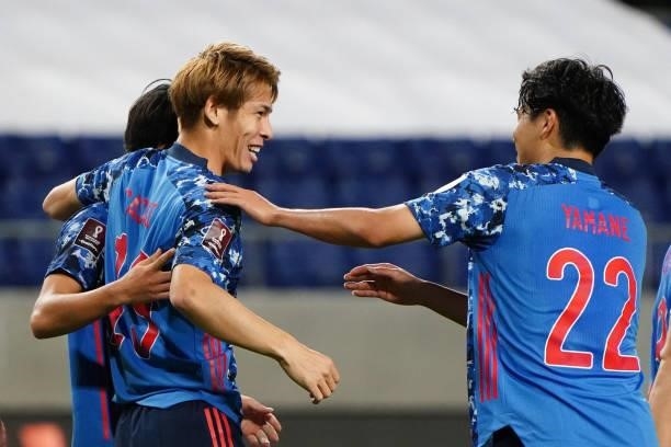 Sho Sasaki of Japan celebrates scoring his side's fourth goal with his team mate during the FIFA World Cup Asian Qualifier second round Group F match...