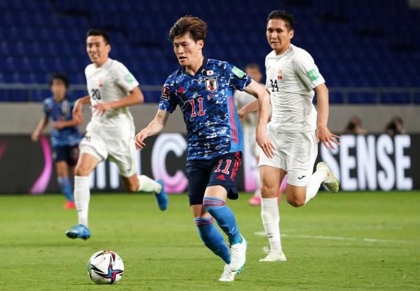 Kyogo Furuhashi of Japan in action during the FIFA World Cup Asian Qualifier second round Group F match between Japan and Kyrgyz at Panasonic Stadium...