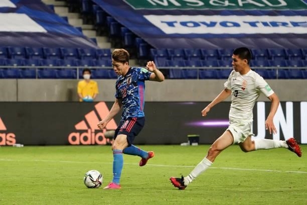 Takuma Asano of Japan scores his side's fifth goal during the FIFA World Cup Asian Qualifier second round Group F match between Japan and Kyrgyz at...