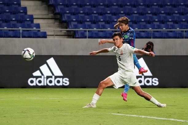 Takuma Asano of Japan shoots at goal during the FIFA World Cup Asian Qualifier second round Group F match between Japan and Kyrgyz at Panasonic...