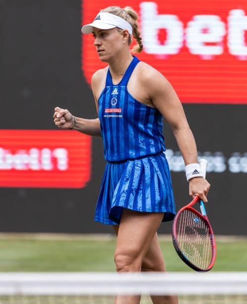 Angelique Kerber of Germany celebrates in the women's singles match against Misaki Doi of Japan during day 4 of the bett1open at LTTC Rot-Weiß e.V....