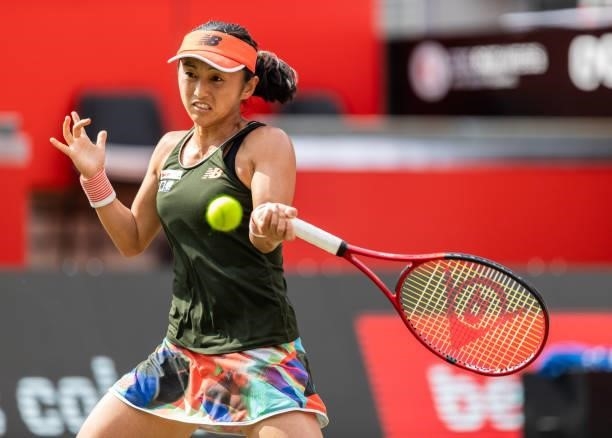 Misaki Doi of Japan hits a forehand against Angelique Kerber of Germany in the women's singles match during day 4 of the bett1open at LTTC Rot-Weiß...
