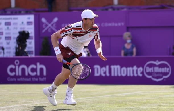Andy Murray of Great Britain scrambles during his First Round match against Benoît Paire of France during Day 2 of the cinch Championships at The...