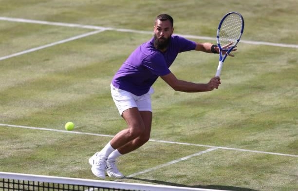 Benoît Paire of France stretches to play a backhand during his First Round match against Andy Murray of Great Britain during Day 2 of the cinch...