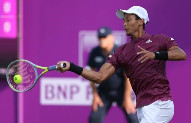 Yen-Hsun Lu of Taiwan plays a forehand during his First Round match against Fabio Fognini of Italy during Day 2 of the cinch Championships at The...