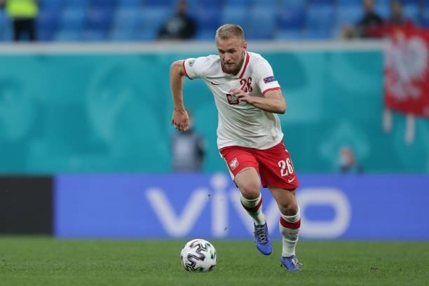 Tymoteusz Puchacz pof Poland controls the ball during the UEFA Euro 2020 Championship Group E match between Poland and Slovakia on June 14, 2021 in...