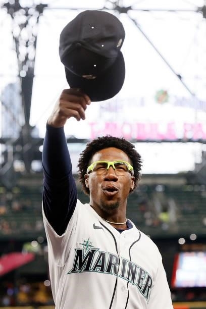 Shed Long Jr. #4 of the Seattle Mariners gestures toward the crowd before the game against the Minnesota Twins at T-Mobile Park on June 14, 2021 in...