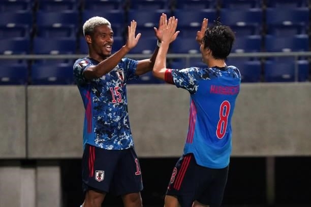 Ado Onaiwu of Japan celebrates scoring his side's third goal and his hat trick during the FIFA World Cup Asian Qualifier 2nd round Group F match...