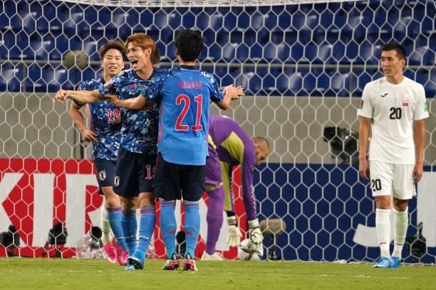 Sho Sakaki of Japan celebrates scoring his side's fourth goal during the FIFA World Cup Asian Qualifier 2nd round Group F match between Japan and...