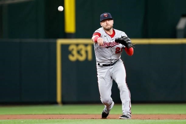 Josh Donaldson of the Minnesota Twins throws to first base against the Seattle Mariners at T-Mobile Park on June 14, 2021 in Seattle, Washington.