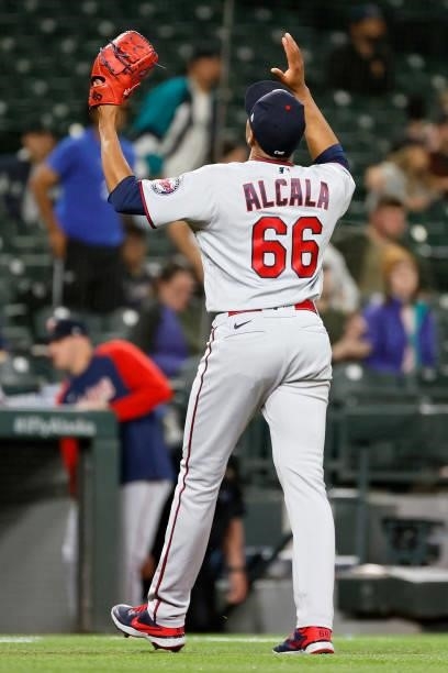 Jorge Alcala of the Minnesota Twins reacts against the Seattle Mariners at T-Mobile Park on June 14, 2021 in Seattle, Washington.