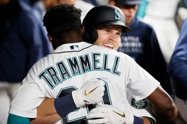 Jake Bauers celebrates his home run with Taylor Trammell of the Seattle Mariners during the eighth inning against the Minnesota Twins at T-Mobile...