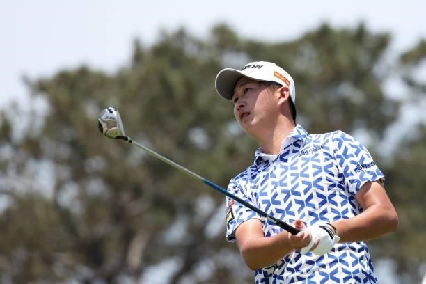 Rikuya Hoshino of Japan watches his tee shot on the second hole during a practice round prior to the start of the 2021 U.S. Open at Torrey Pines Golf...