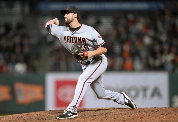 Stefan Crichton of the Arizona Diamondbacks pitches against the San Francisco Giants in the bottom of the eighth inning at Oracle Park on June 14,...