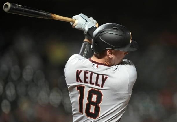 Carson Kelly of the Arizona Diamondbacks hits a single against the San Francisco Giants in the top of the eighth inning at Oracle Park on June 14,...