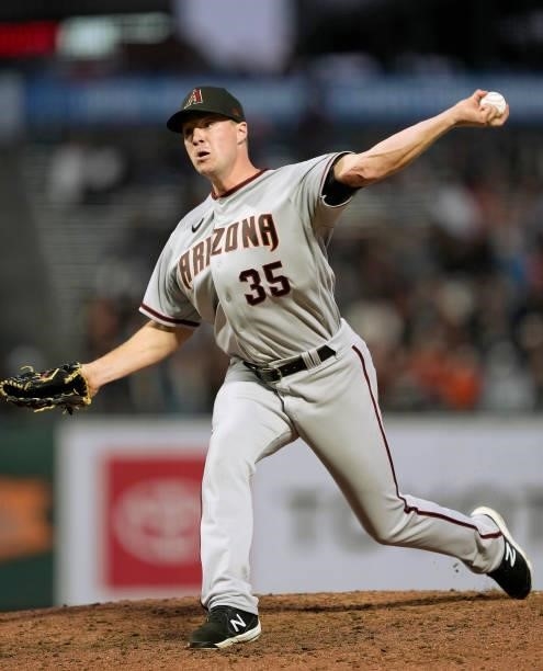 Joe Mantiply of the Arizona Diamondbacks pitches against the San Francisco Giants in the bottom of the six inning at Oracle Park on June 14, 2021 in...