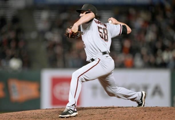 Stefan Crichton of the Arizona Diamondbacks pitches against the San Francisco Giants in the bottom of the eighth inning at Oracle Park on June 14,...