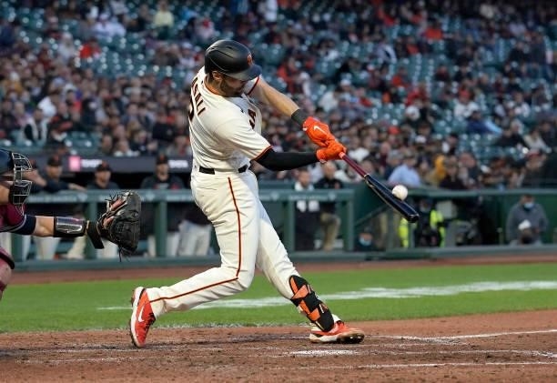 Curt Casali of the San Francisco Giants bats against the Arizona Diamondbacks in the bottom of the fifth inning at Oracle Park on June 14, 2021 in...