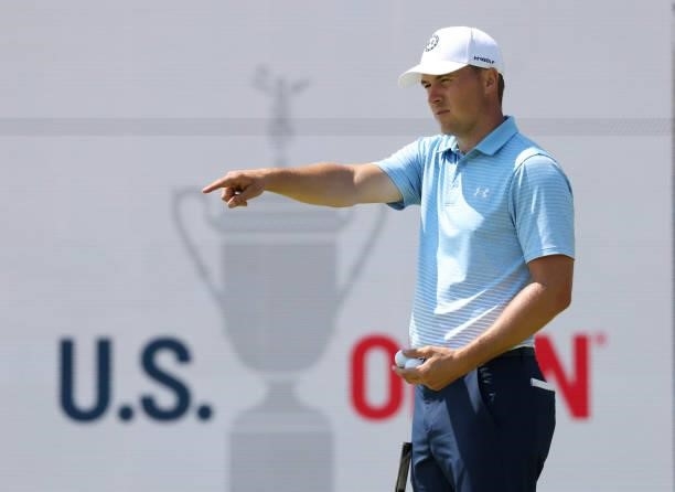 Jordan Spieth of the United States gestures on the 17th green during a practice round prior to the start of the 2021 U.S. Open at Torrey Pines Golf...