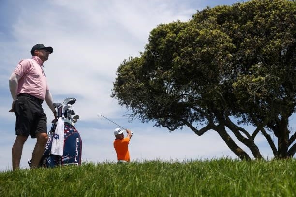 Justin Suh of the United States plays a shot during a practice round prior to the start of the 2021 U.S. Open at Torrey Pines Golf Course on June 15,...